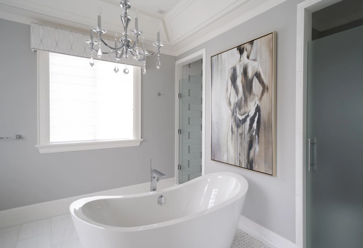 beautiful bathroom: tub and painting of a lady in a bath robe